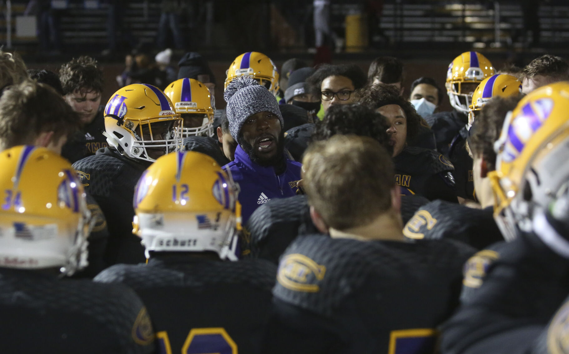 Hickman head coach Cedric Alvis gives a speech to his team after their loss to Jackson